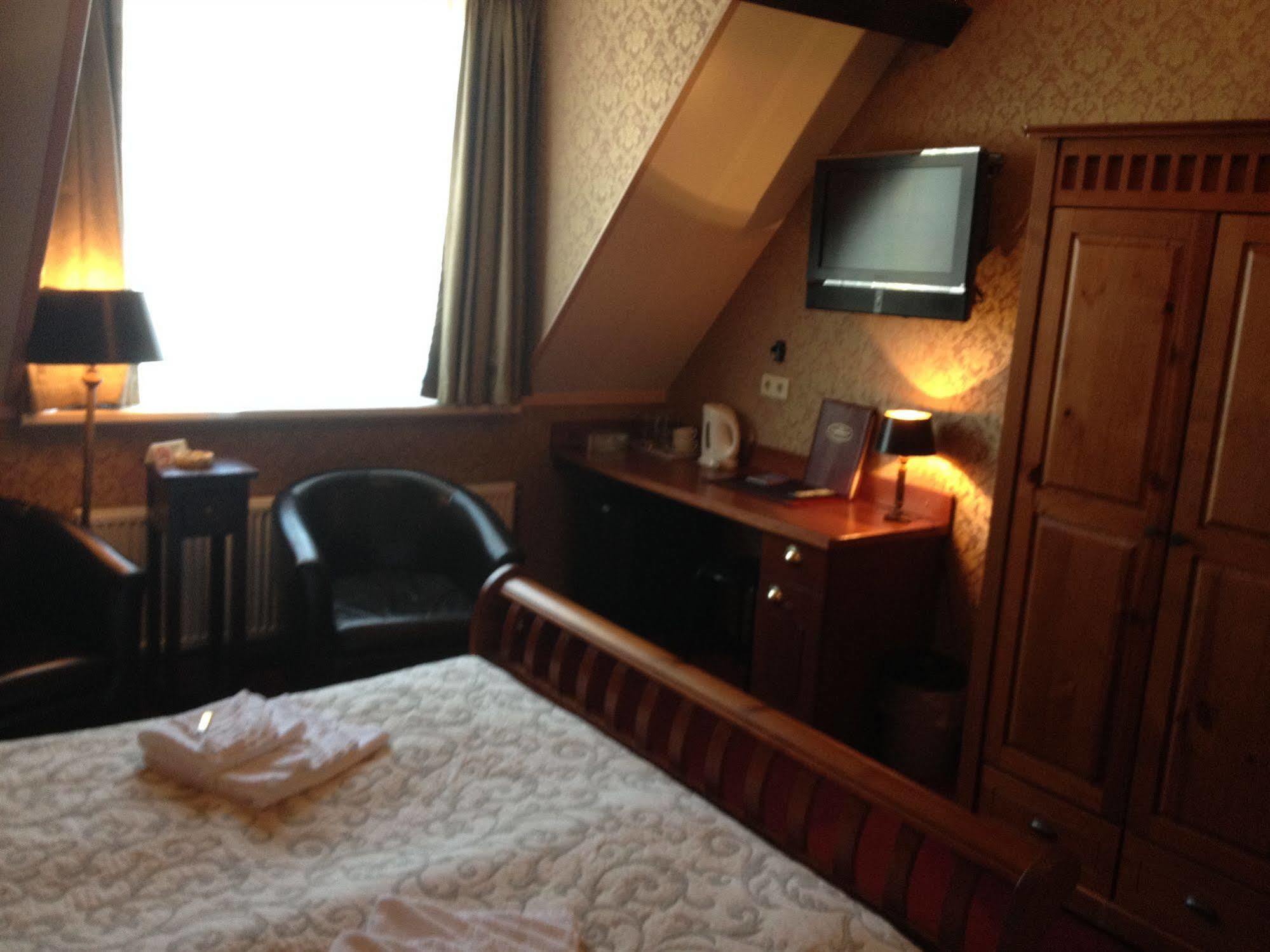 Amsterdam Village Hotel Bagian luar foto